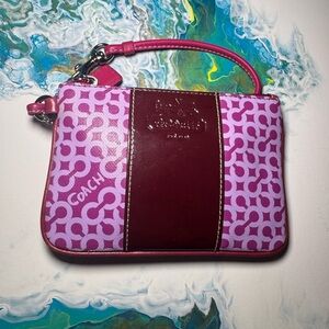 COACH- NEW WRISTLET MAROON AND FUCHSAI